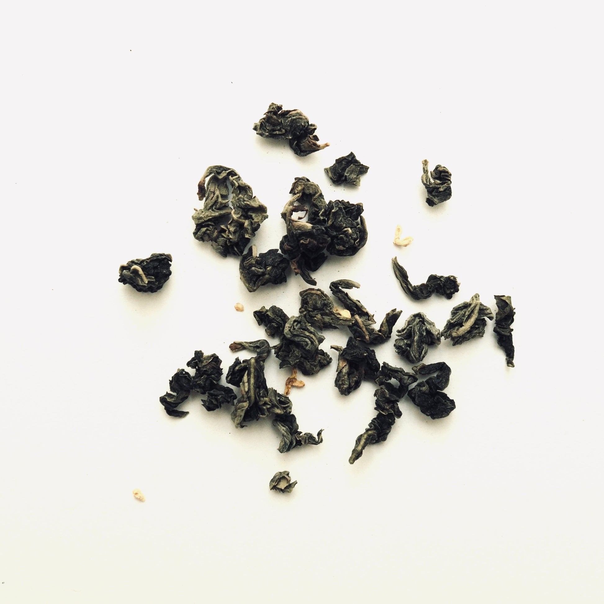 Tie Guan Yin Oolong tea scented with osmanthus flowers.